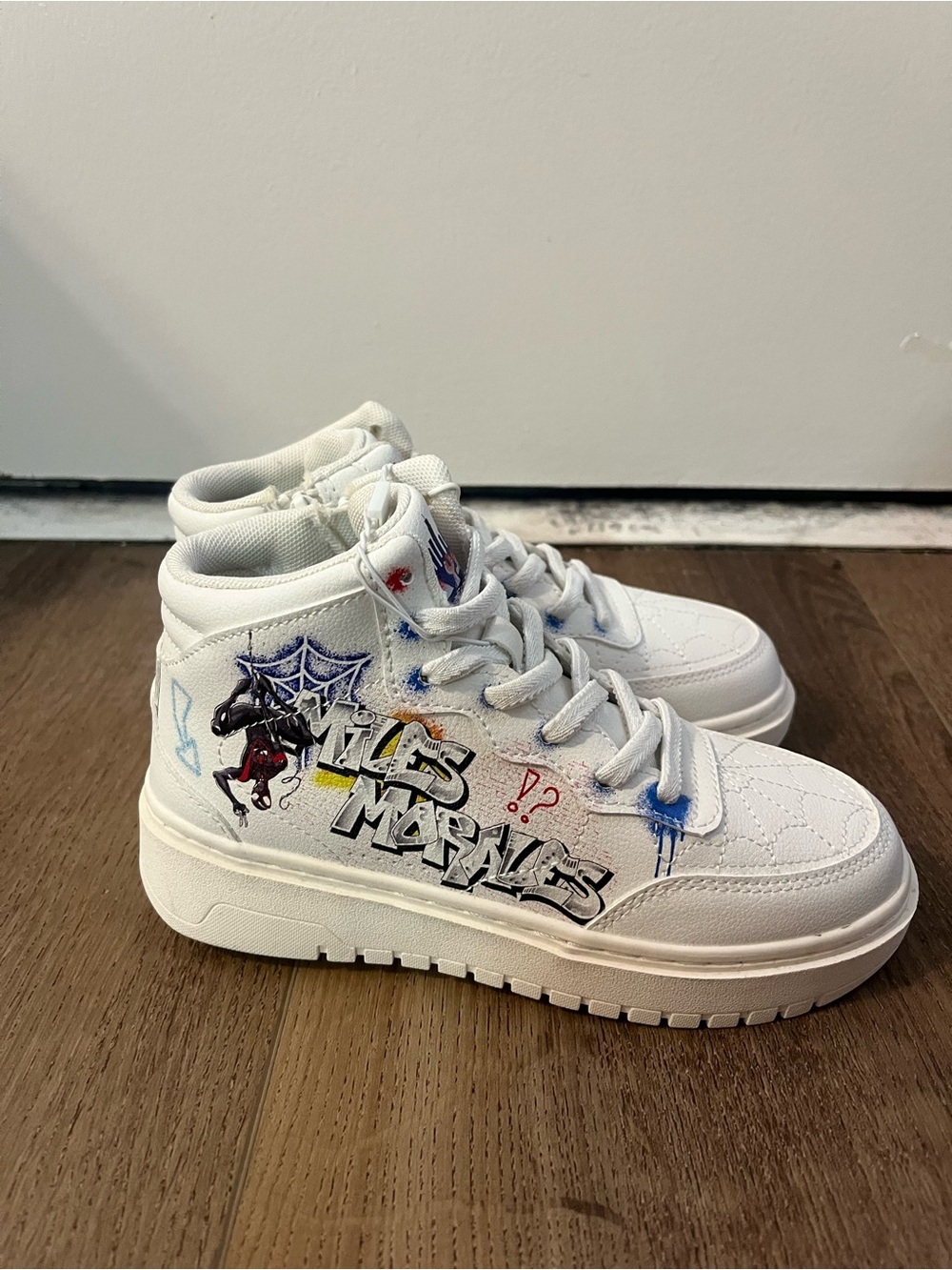 Zara White High-Top Sneakers with Graphic Spider and Blue Accents kids size 1